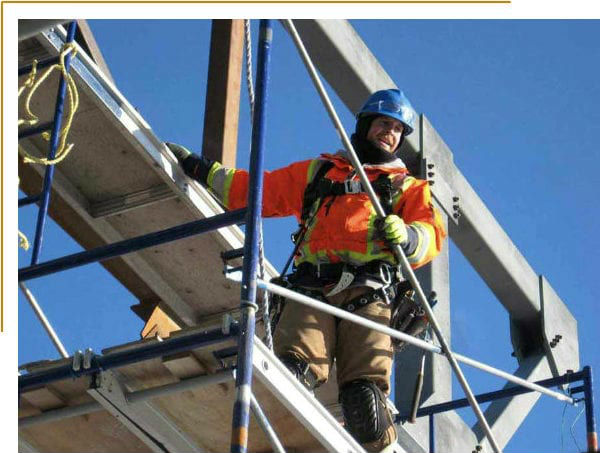 A man on a scaffolding at work